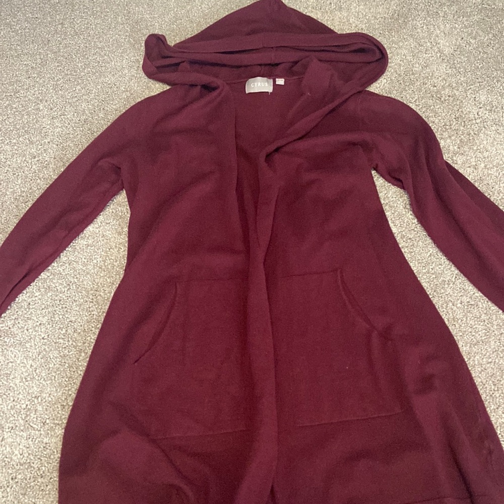 Hooded maroon sweater. Long. With pockets. Size large.